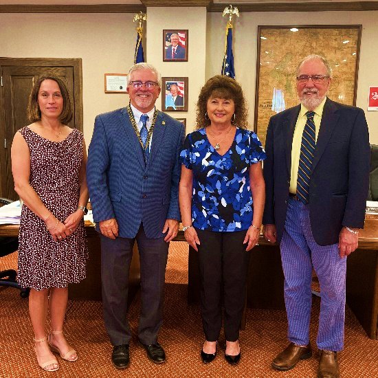 Assistant CEO of the Human Resources Center (HRC) Kristin Grimm, left, Chairman of the Pike County Commissioners Matthew Osterberg, CEO of HRC Darlene Glynn, and Pike County Commissioner Tony Waldron.